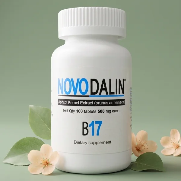 Bottle of amygdalin tablets with apricot flowers beside it